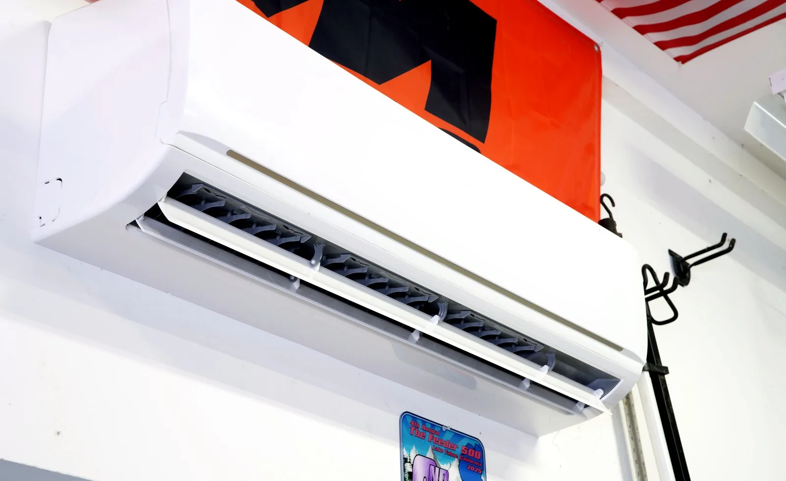 Wall-mounted ductless mini split head installed indoors